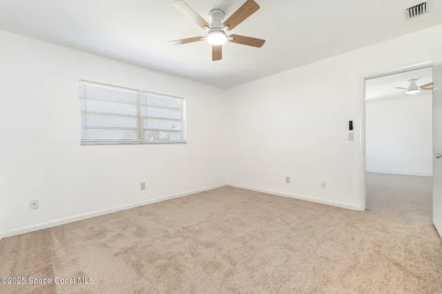 a view of a storage & utility room with a washer and dryer