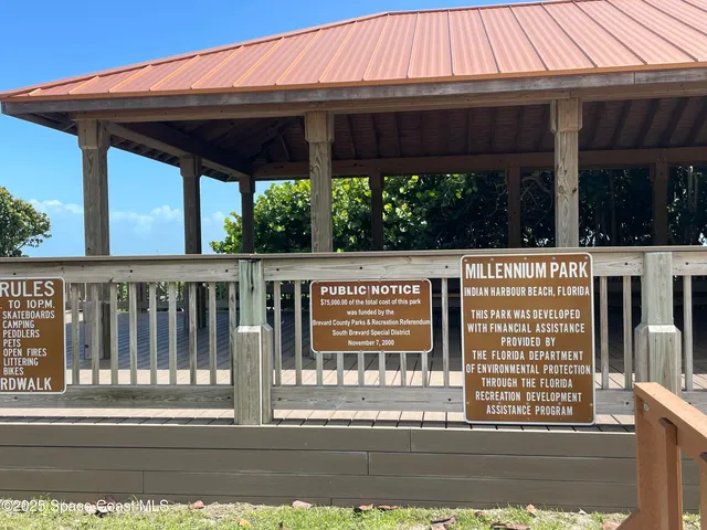 a front view of a house with a yard table and chairs
