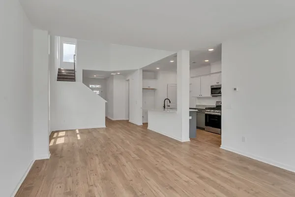 a view of a kitchen with a sink and a kitchen