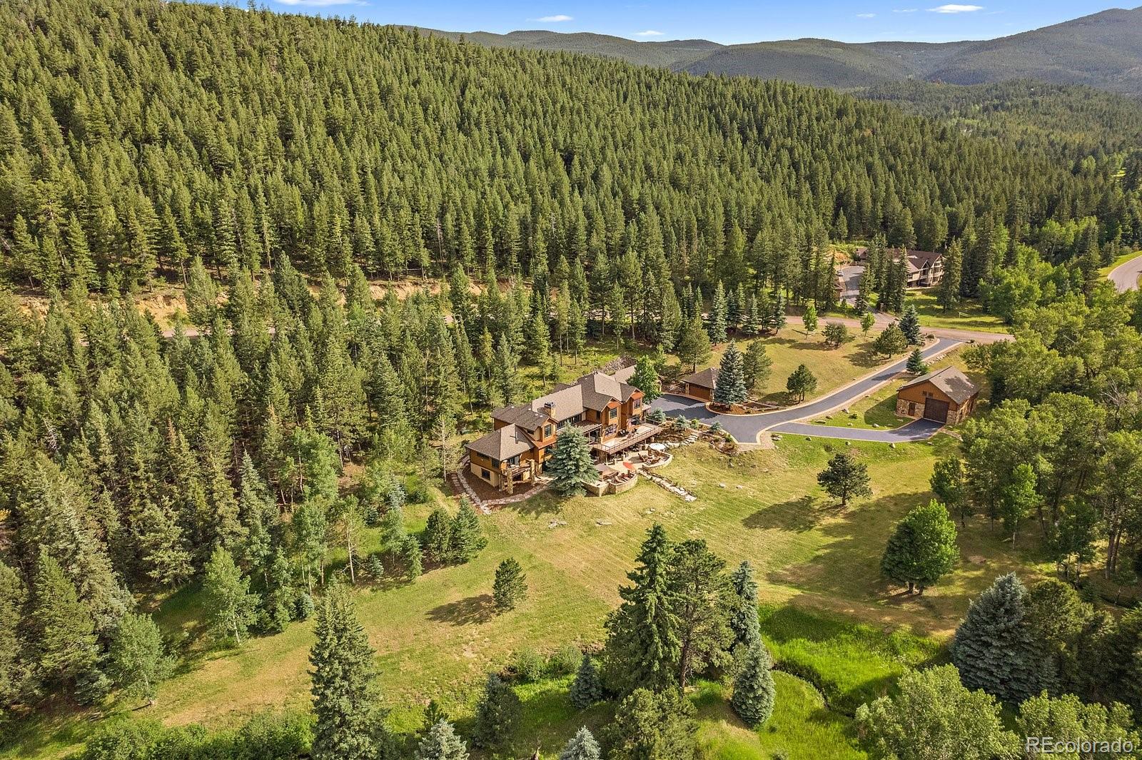 33833 Deep Forest Road Evergreen, CO 80439 - Photo 1 of 40 Gallery Image 1