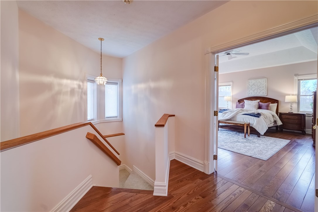 87 Sycamore Ridge Mendon, NY 14472 - Photo 40 of 50 Stairway to basement and view of primary bedroom.