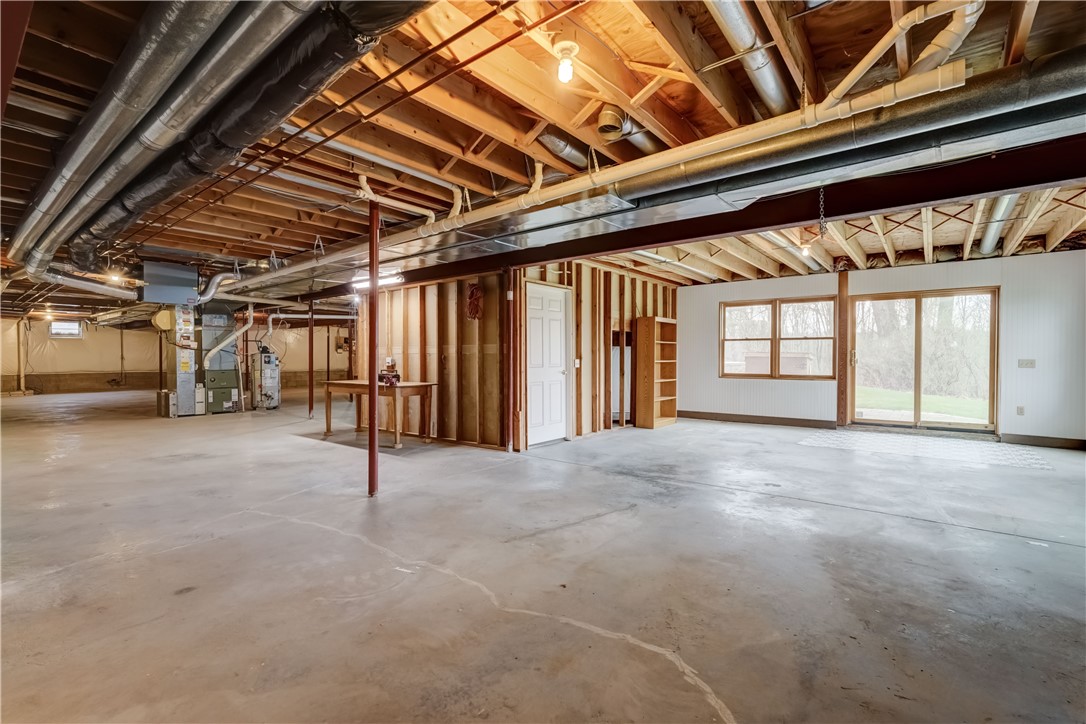 87 Sycamore Ridge Mendon, NY 14472 - Photo 43 of 50 Basement egress sliding door to patio.