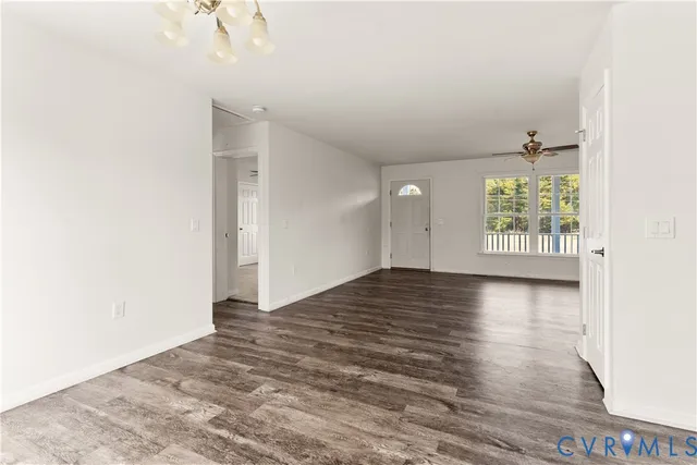 a view of an empty room and window