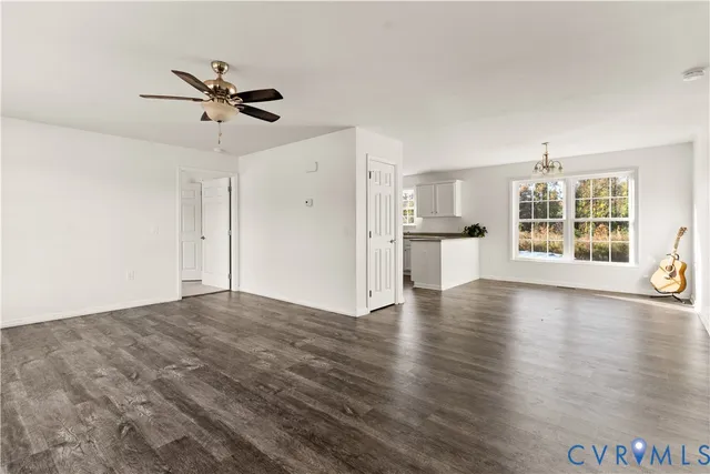 a view of a kitchen with a dishwasher cabinets and a wooden floor
