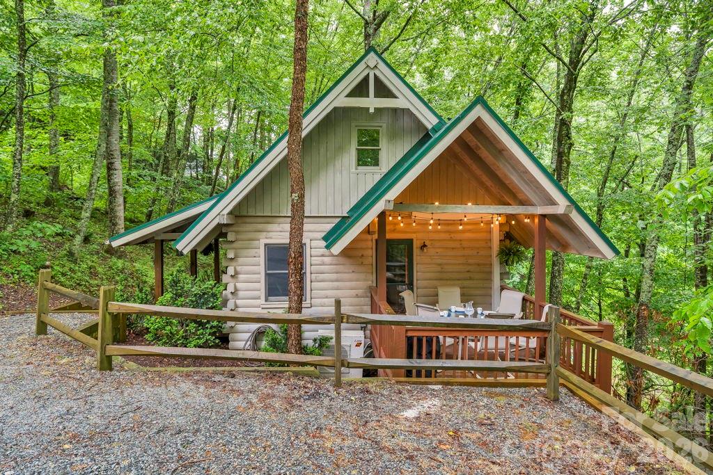 192 Dewitt Barnett Road, Unit 2 Vilas, NC 28692 - Photo 2 of 32 a front view of a house with a yard
