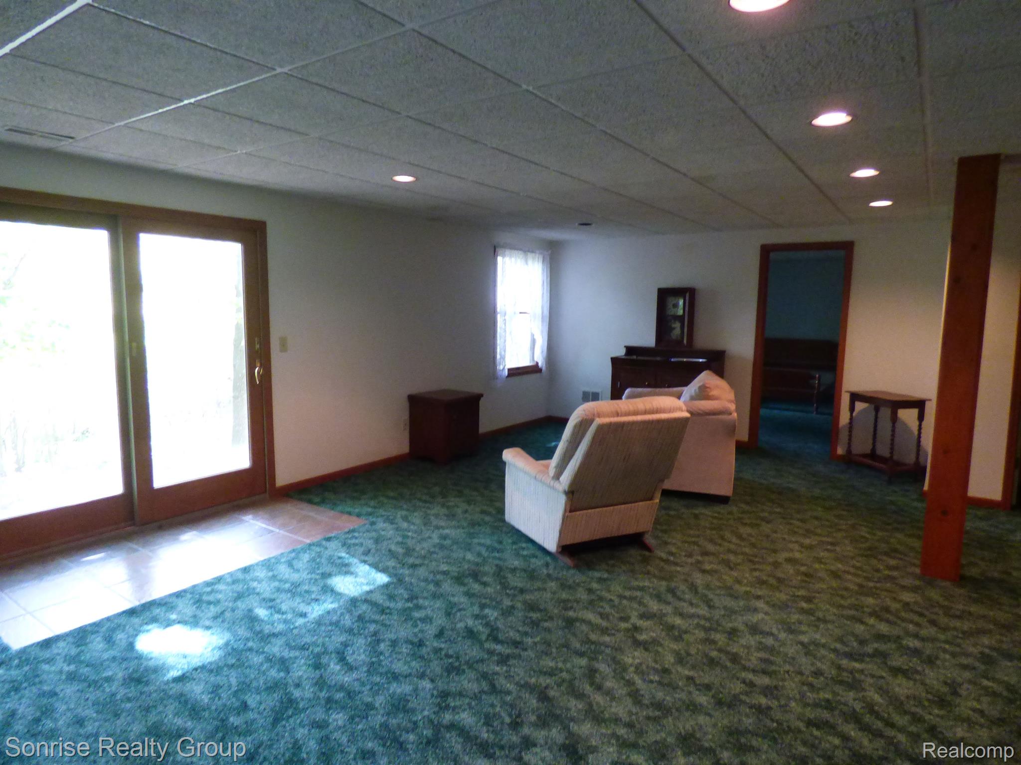 10232 Spencer Road Brighton, MI 48114 - Photo 21 of 32 Lower Level Family Room