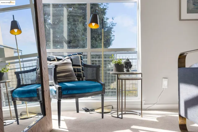 a bedroom with a bed and a mirror