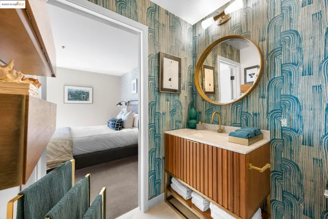 a bathroom with a shower curtain and a window