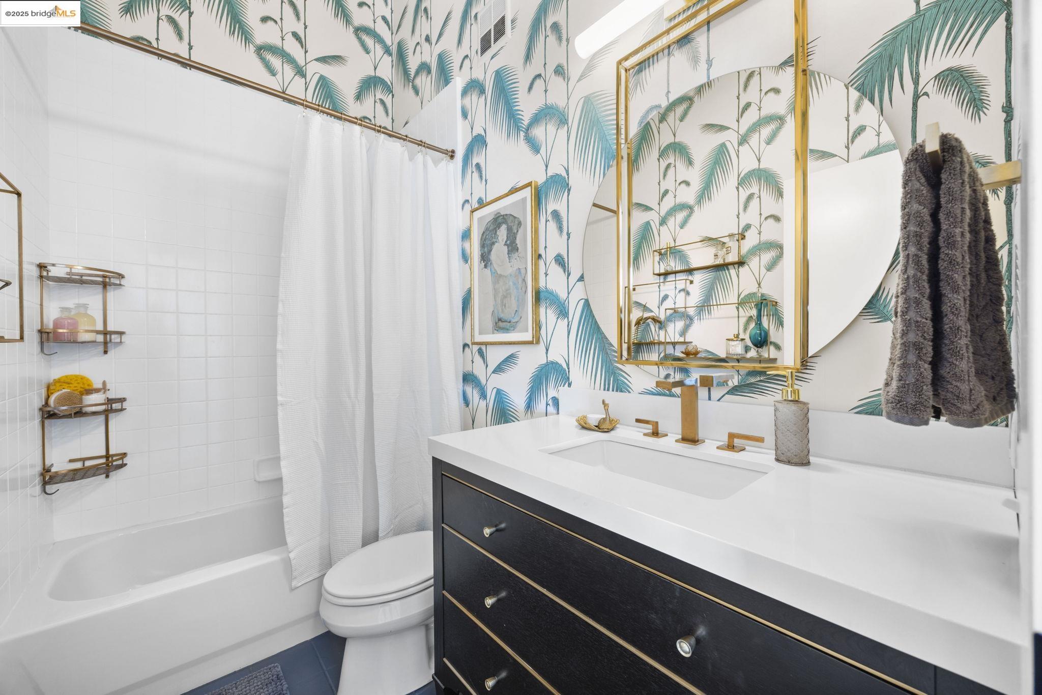 1007 41st Street, Unit 334 Oakland, CA 94608 - Photo 30 of 59 a bathroom with a sink toilet and shower