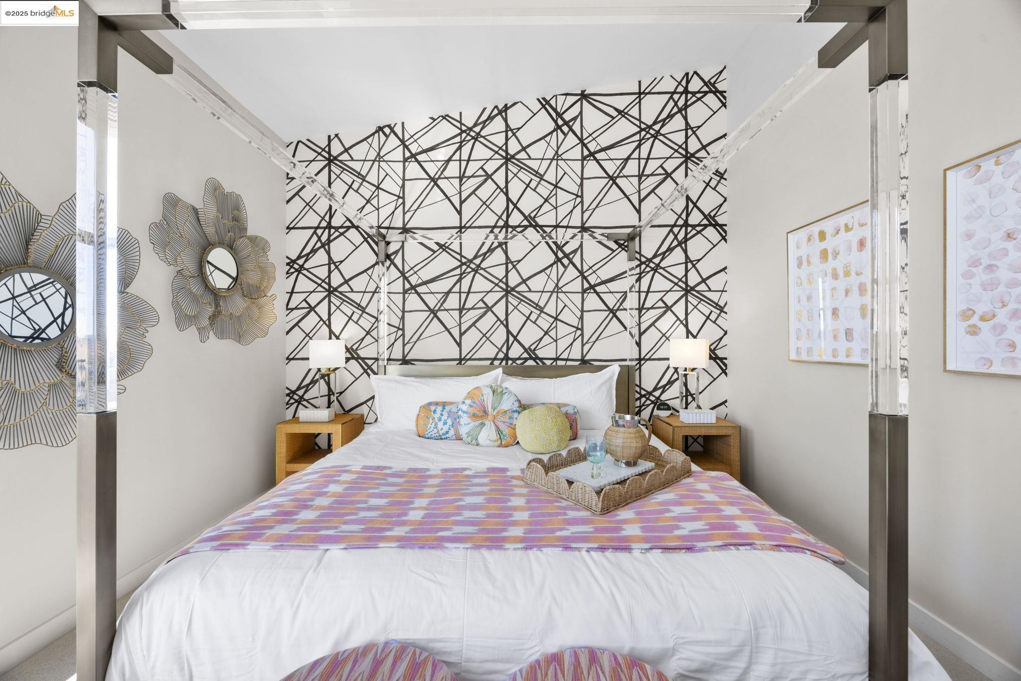 1007 41st Street, Unit 334 Oakland, CA 94608 - Photo 38 of 59 a bedroom with a bed and a wall painting