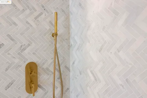 a view of a street with potted plants