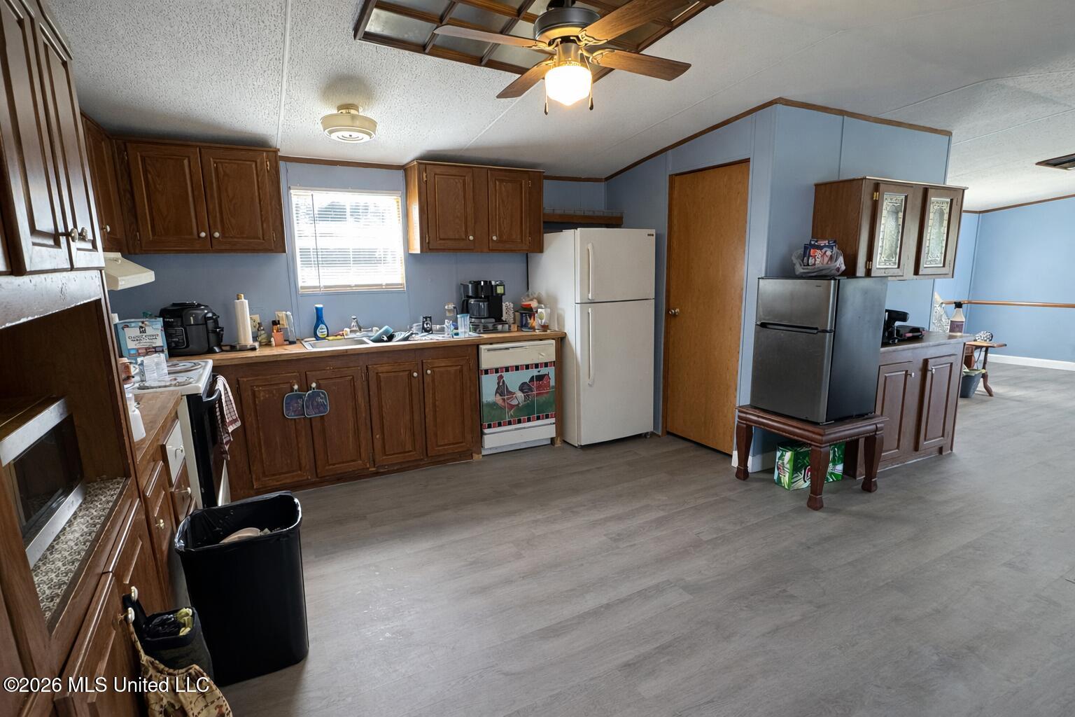 15068 Coggins Cove Saucier, MS 39574 - Photo 9 of 21 kitchen to living