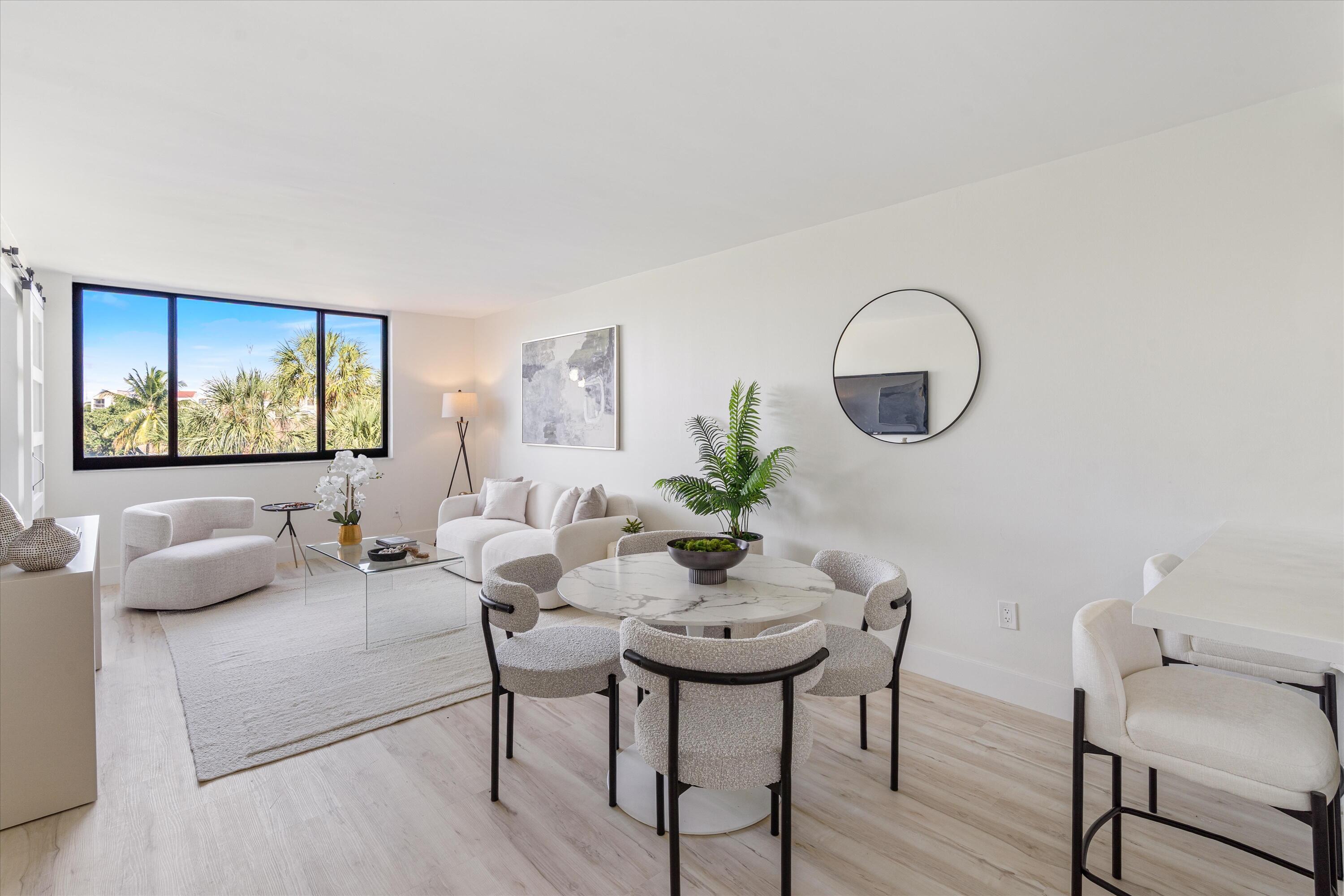 755 Dotterel Road, Unit 1307 Delray Beach, FL 33444 - Photo 11 of 36 a living room with furniture and a potted plant