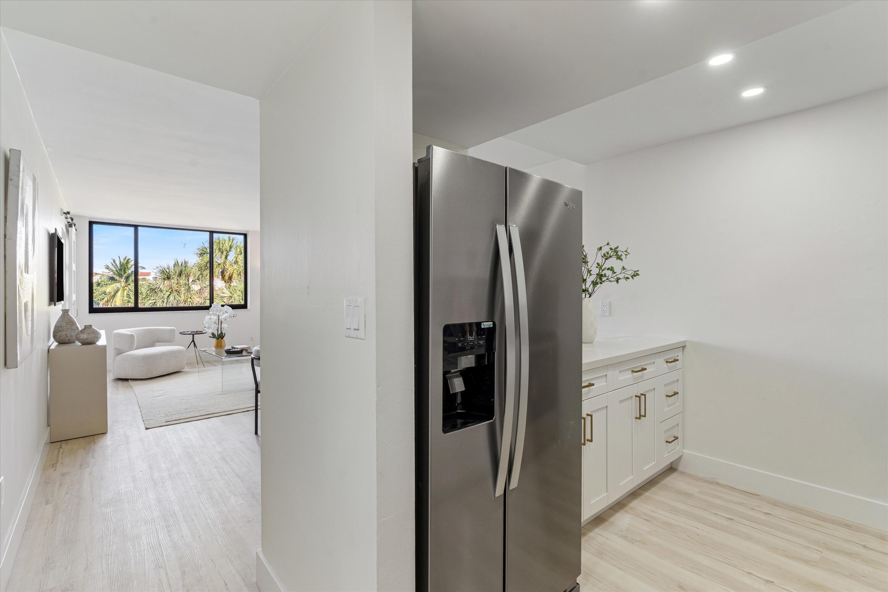 755 Dotterel Road, Unit 1307 Delray Beach, FL 33444 - Photo 7 of 36 a view of a refrigerator in kitchen and a window