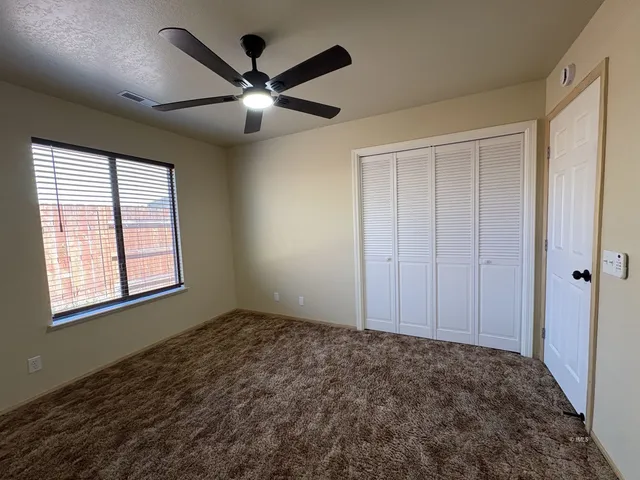 a view of a room with closet area