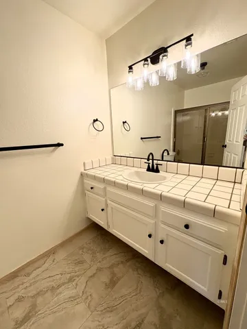 a backyard of a house with seating space