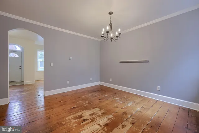 a kitchen with stainless steel appliances granite countertop a stove and a refrigerator
