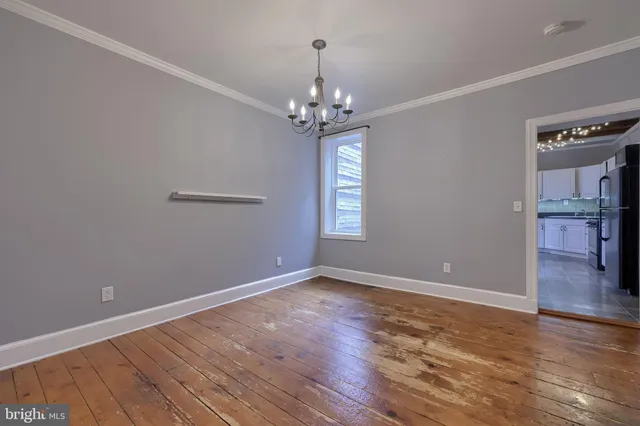 a view of a room that has a window in it