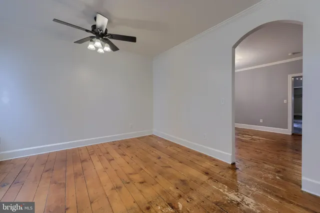 a bathroom with a bath tub with a shower