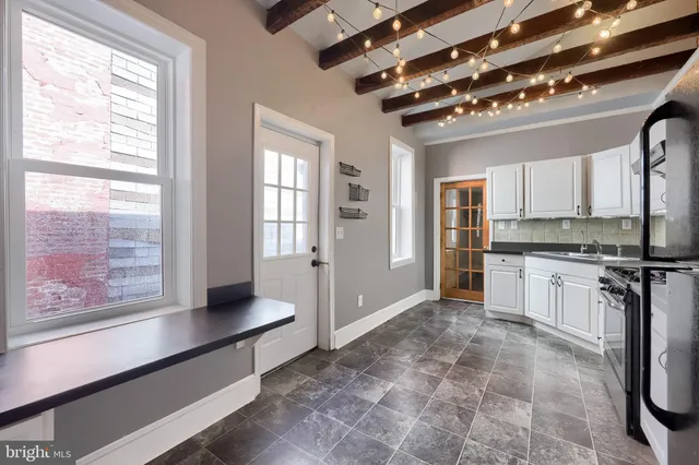 a view of a small yard and a fountain