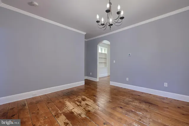 a kitchen with stainless steel appliances granite countertop a stove and a refrigerator