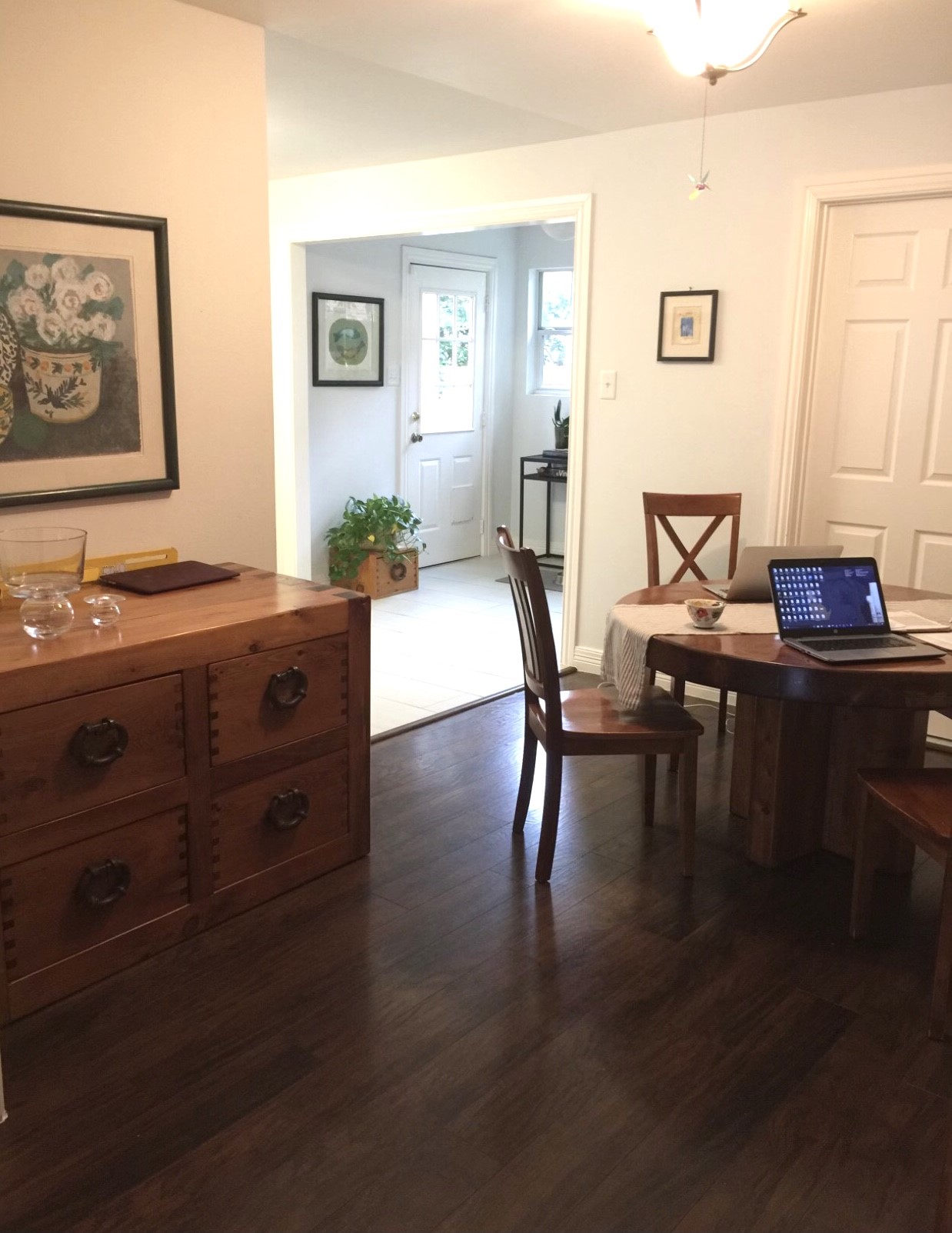 4416 Holt Street Bellaire, TX 77401 - Photo 4 of 12 a view of a dining room with furniture and wooden floor