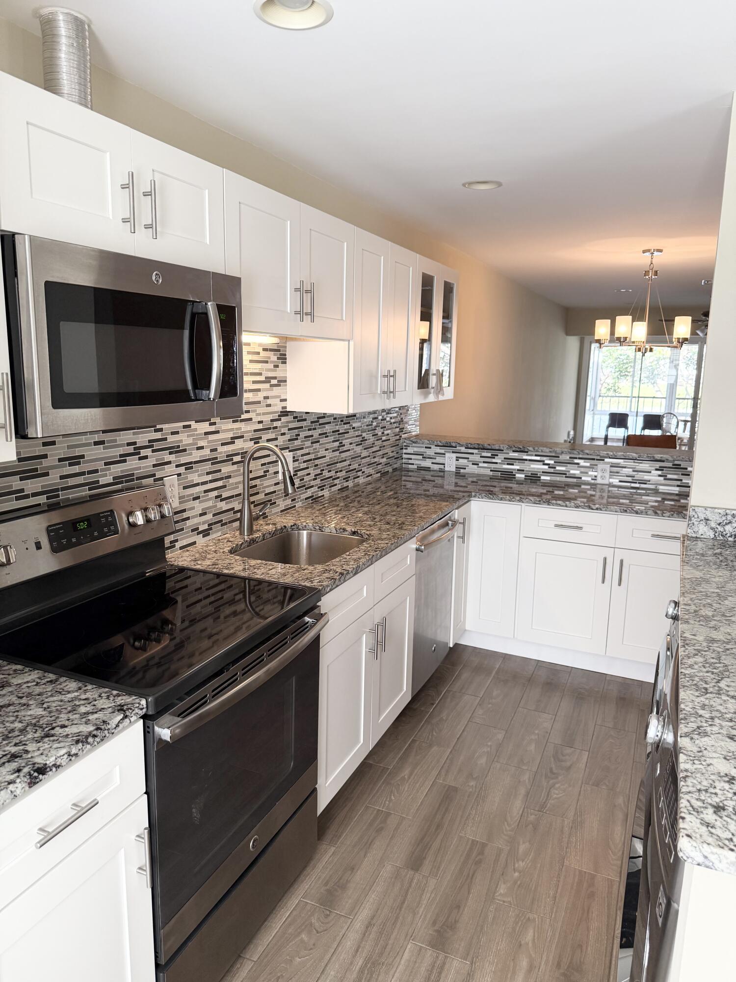 2811 Southwest 15th Street, Unit 202 Delray Beach, FL 33445 - Photo 5 of 35 Kitchen