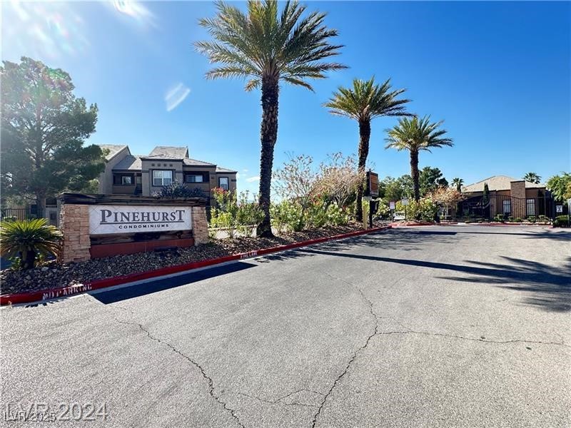 6650 West Warm Springs Road, Unit 2007 Las Vegas, NV 89118 - Photo 1 of 26 View of asphalt road featuring curbs