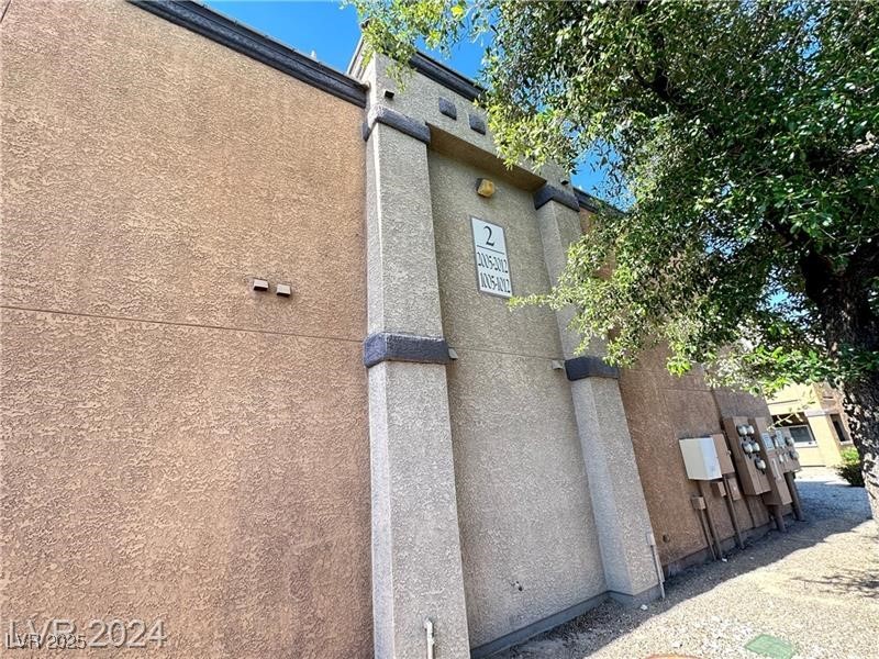 6650 West Warm Springs Road, Unit 2007 Las Vegas, NV 89118 - Photo 21 of 26 Exterior view of stucco siding