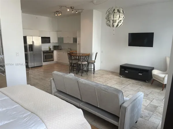 a bathroom with a toilet and a sink