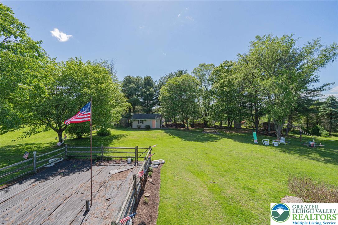 341 Lower Greenhill Road Kunkletown, PA 18058 - Photo 48 of 69 A spacious, verdant yard with mature trees offers a serene natural escape.