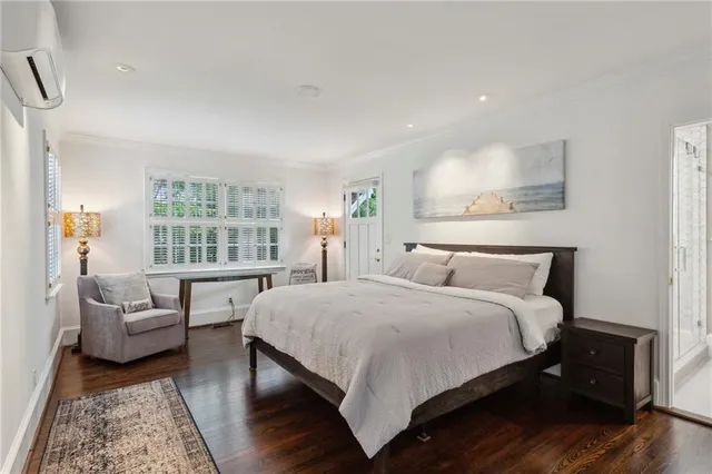 a bedroom with a bed and a couch