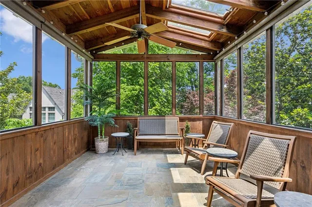 a outdoor living space with furniture and garden view