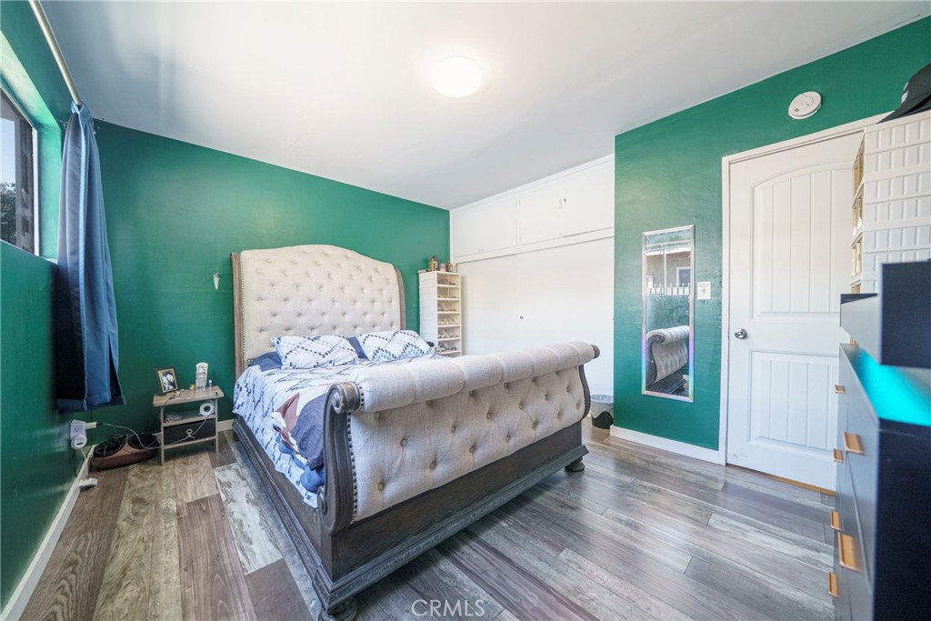 2137 Pepper Drive Highland, CA 92346 - Photo 16 of 35 a bedroom with a bed and a table