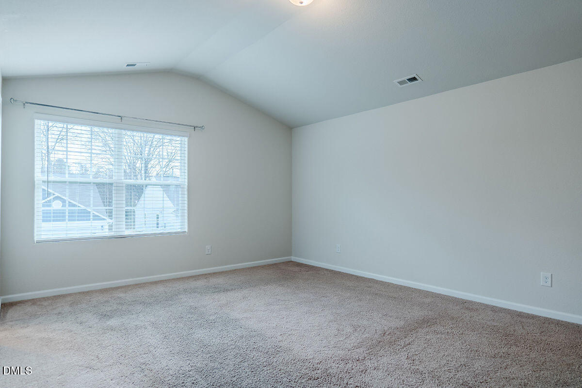 2036 Alderman Way Creedmoor, NC 27522 - Photo 25 of 49 an empty room with a window