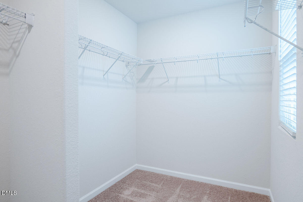 2036 Alderman Way Creedmoor, NC 27522 - Photo 29 of 49 a view of a room with racks on the wall