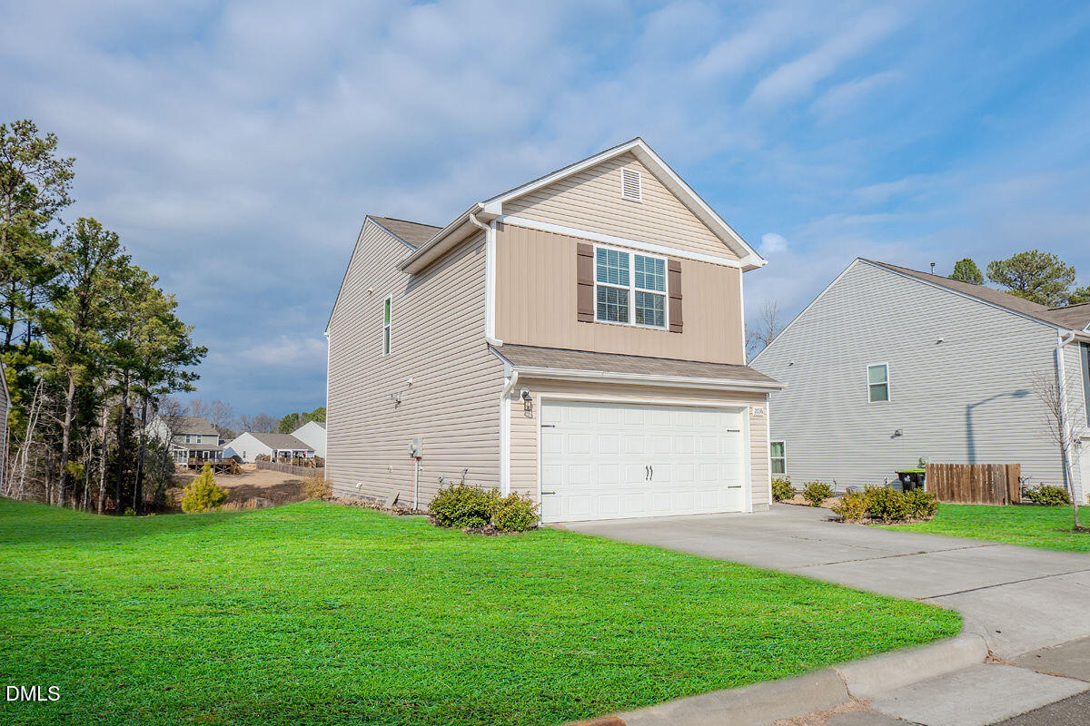2036 Alderman Way Creedmoor, NC 27522 - Photo 3 of 49 a front view of house with yard