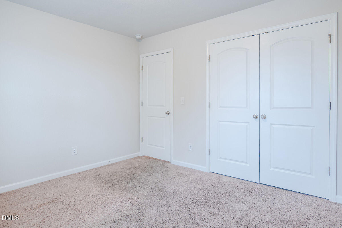 2036 Alderman Way Creedmoor, NC 27522 - Photo 32 of 49 a view of an empty room