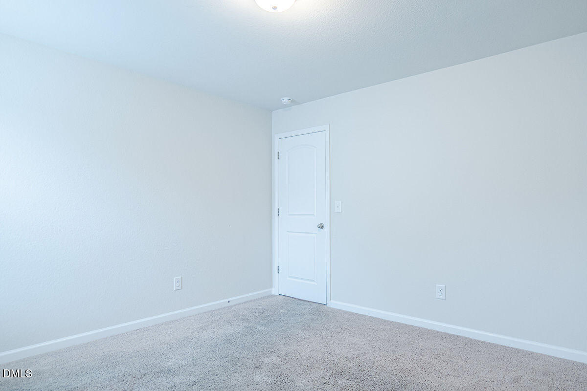 2036 Alderman Way Creedmoor, NC 27522 - Photo 34 of 49 a view of an empty room