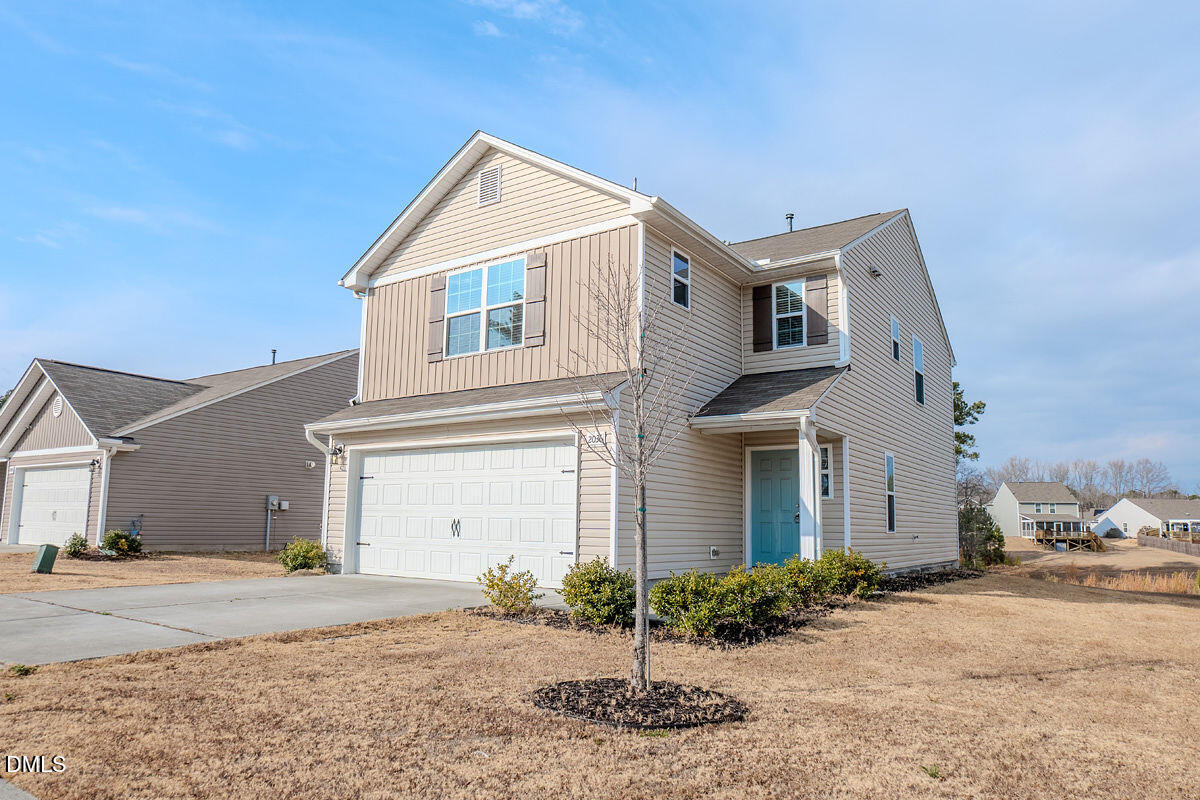 2036 Alderman Way Creedmoor, NC 27522 - Photo 4 of 49 a view of a house with a patio