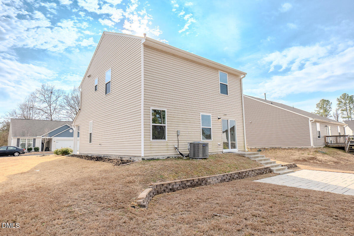 2036 Alderman Way Creedmoor, NC 27522 - Photo 42 of 49 a view of a house with a patio