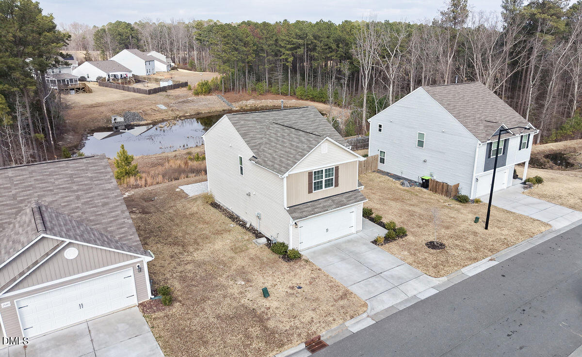 2036 Alderman Way Creedmoor, NC 27522 - Photo 43 of 49 a view of a house with a yard