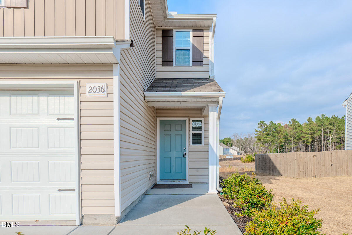 2036 Alderman Way Creedmoor, NC 27522 - Photo 7 of 49 a view of front door of house