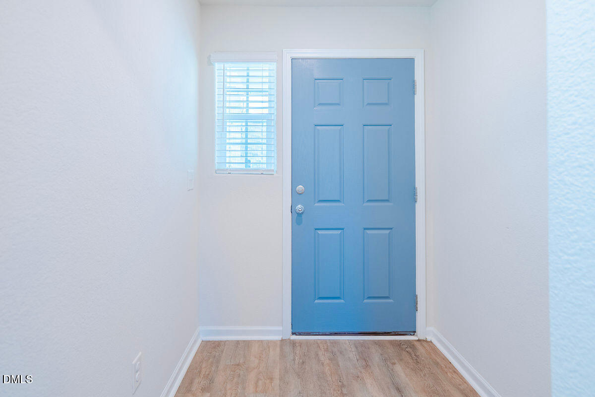 2036 Alderman Way Creedmoor, NC 27522 - Photo 8 of 49 an empty room with closet and window