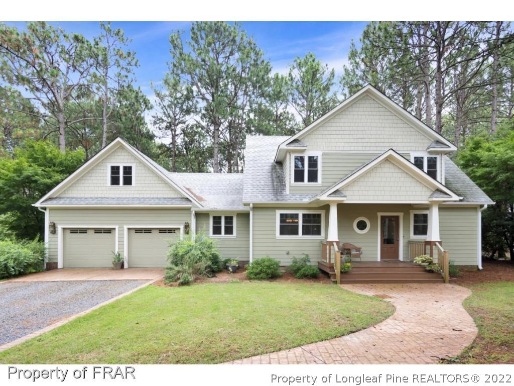 6839 Uppingham Road Fayetteville, NC 28306 - Photo 1 of 36 front view of a house with a yard