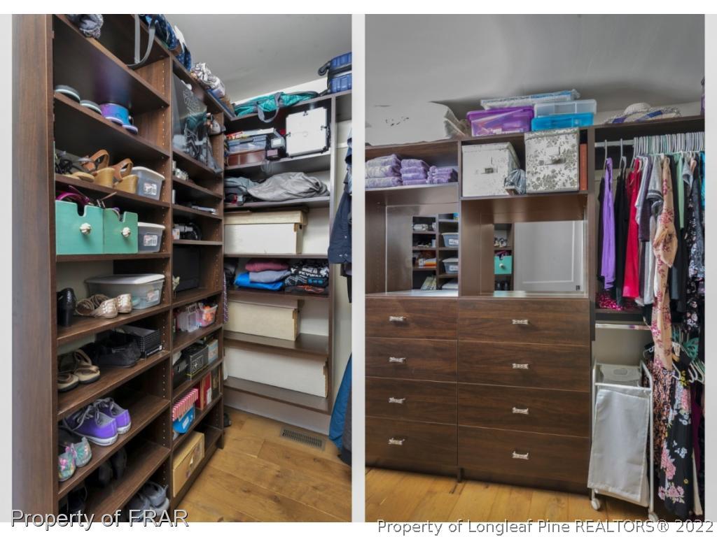 6839 Uppingham Road Fayetteville, NC 28306 - Photo 23 of 36 a view of walk in closet with clothes and shoes