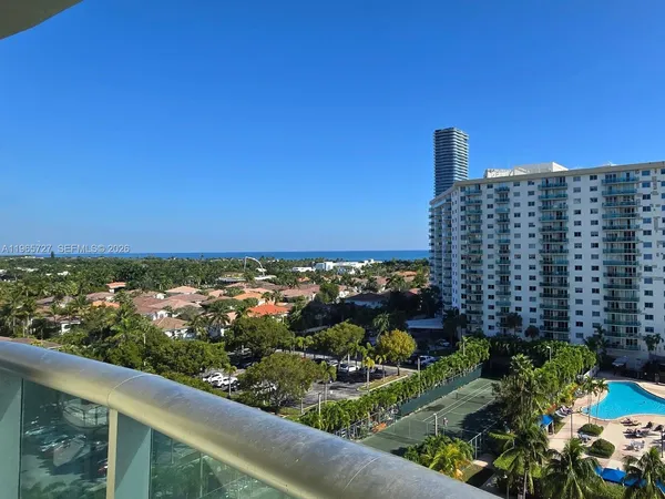 a view of a building from a balcony