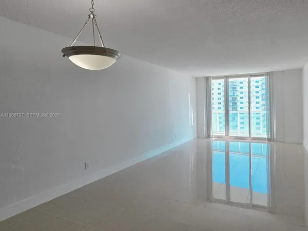 a view of a room with a sink and a window