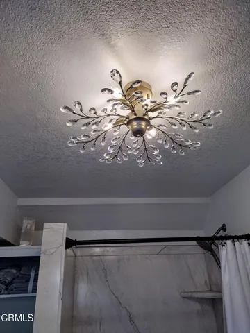 a room with a stove and a cabinet