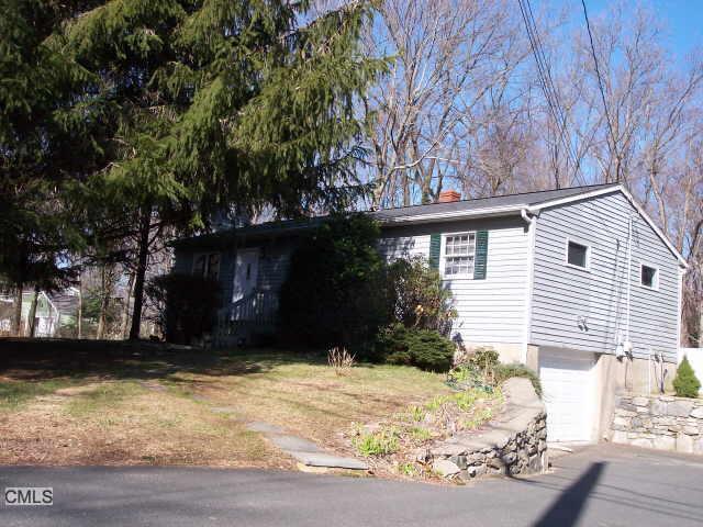 23 Blake Road Monroe, CT 06468 - Photo 1 of 1 a view of a house with a yard